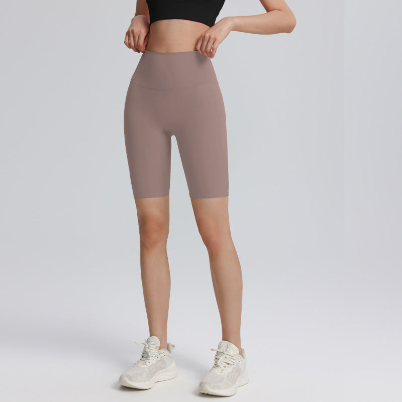 Cross hollow yoga pants stretch tight fitness pants nude breathable quick-drying high waist tummy five-point cycling pants
