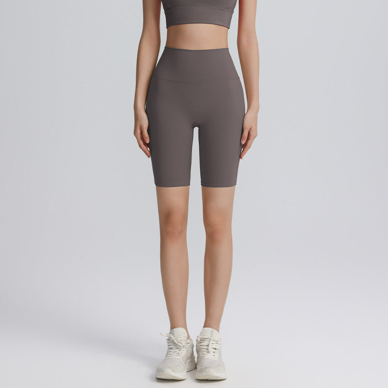 Cross hollow yoga pants stretch tight fitness pants nude breathable quick-drying high waist tummy five-point cycling pants