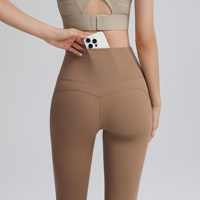 No panties, nude yoga pants, women's belts, pockets, high-waisted hip lift, abdominal tuck-in, elastic can be worn outside, sports running gym pants