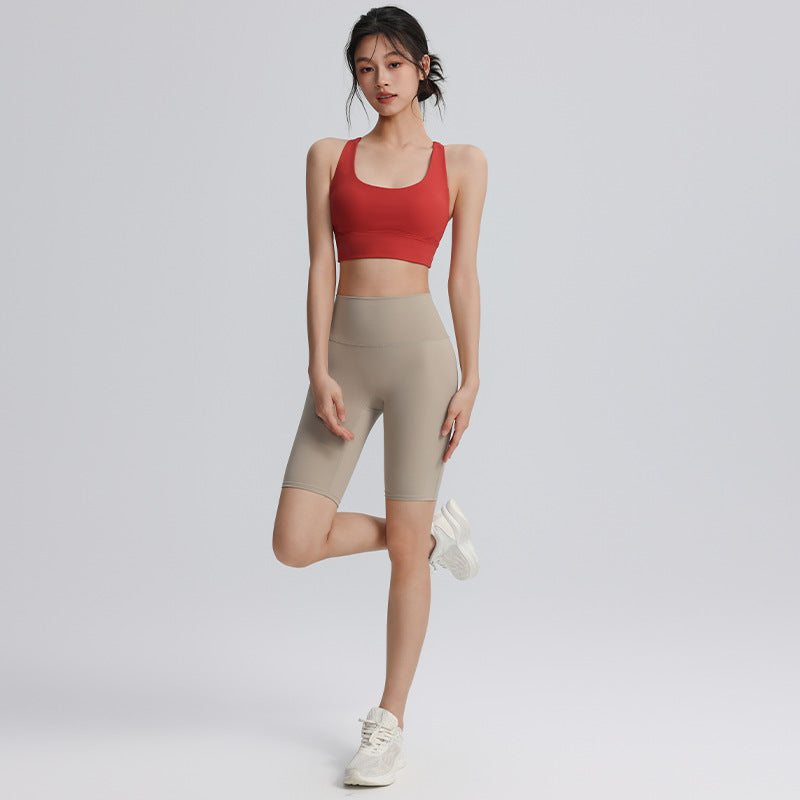 Cross hollow yoga pants stretch tight fitness pants nude breathable quick-drying high waist tummy five-point cycling pants